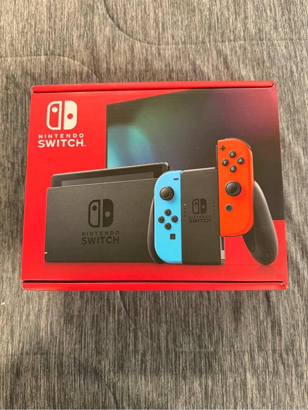 Nintendo Switch Console with Blue and Red Joy‑Con Controllers